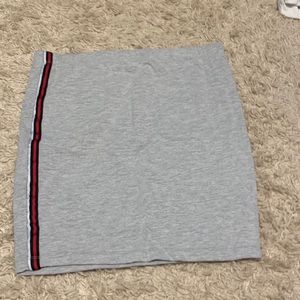 Women’s gray skirt with a red and blue line
